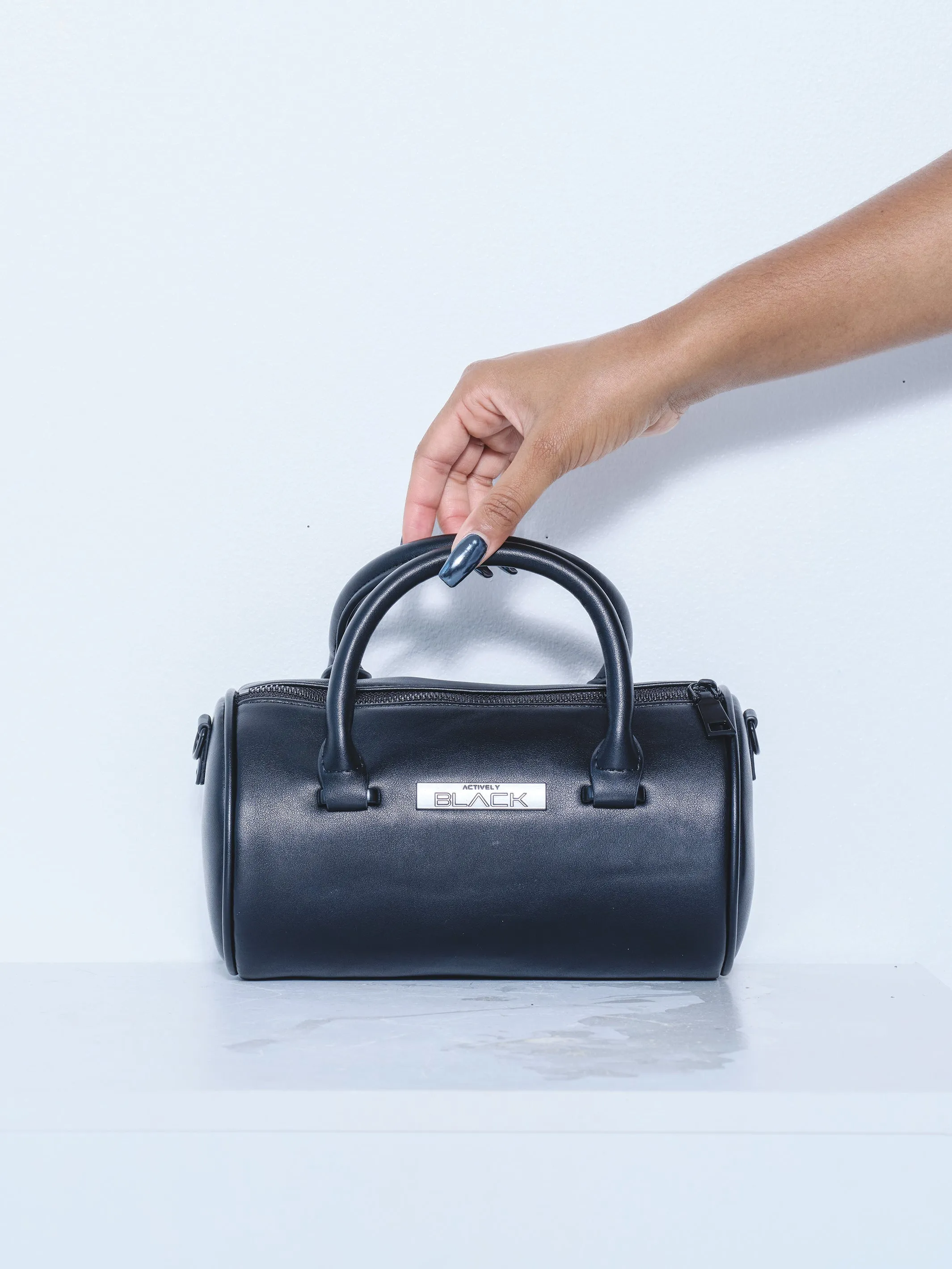 Black Fist Mini Barrel Handbag