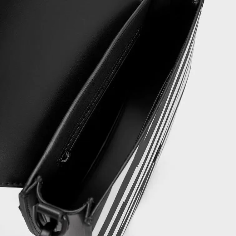 Charles & Keith Gabine Saddle Bag Zebra Print (Black)